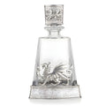 Glass and pewter decanter with Welsh dragon engraving.