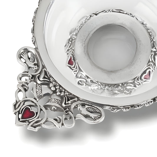 Glass and pewter quaich bowl with intricate Celtic design and red heart accents.