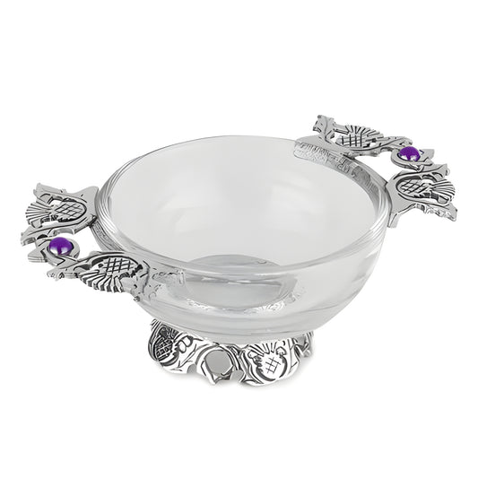 Glass quaich bowl with thistle handles and purple jewels on silver accents.