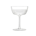 Elegant ribbed design groove glass champagne saucer on white background