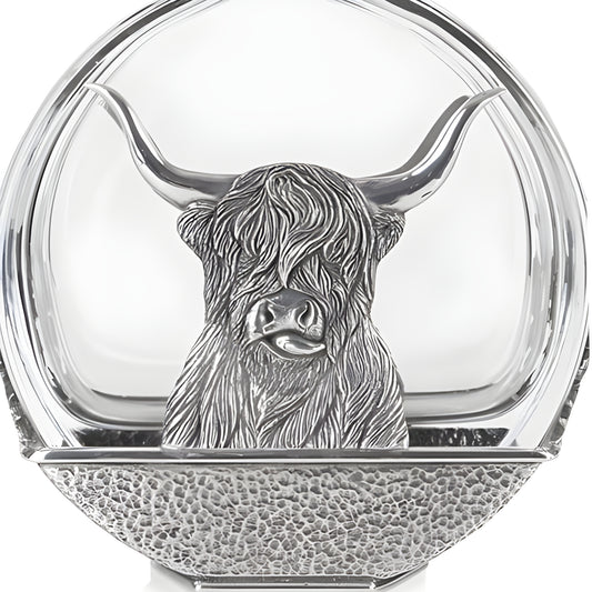 Silver highland cow decanter with glass bottle and Scottish design.