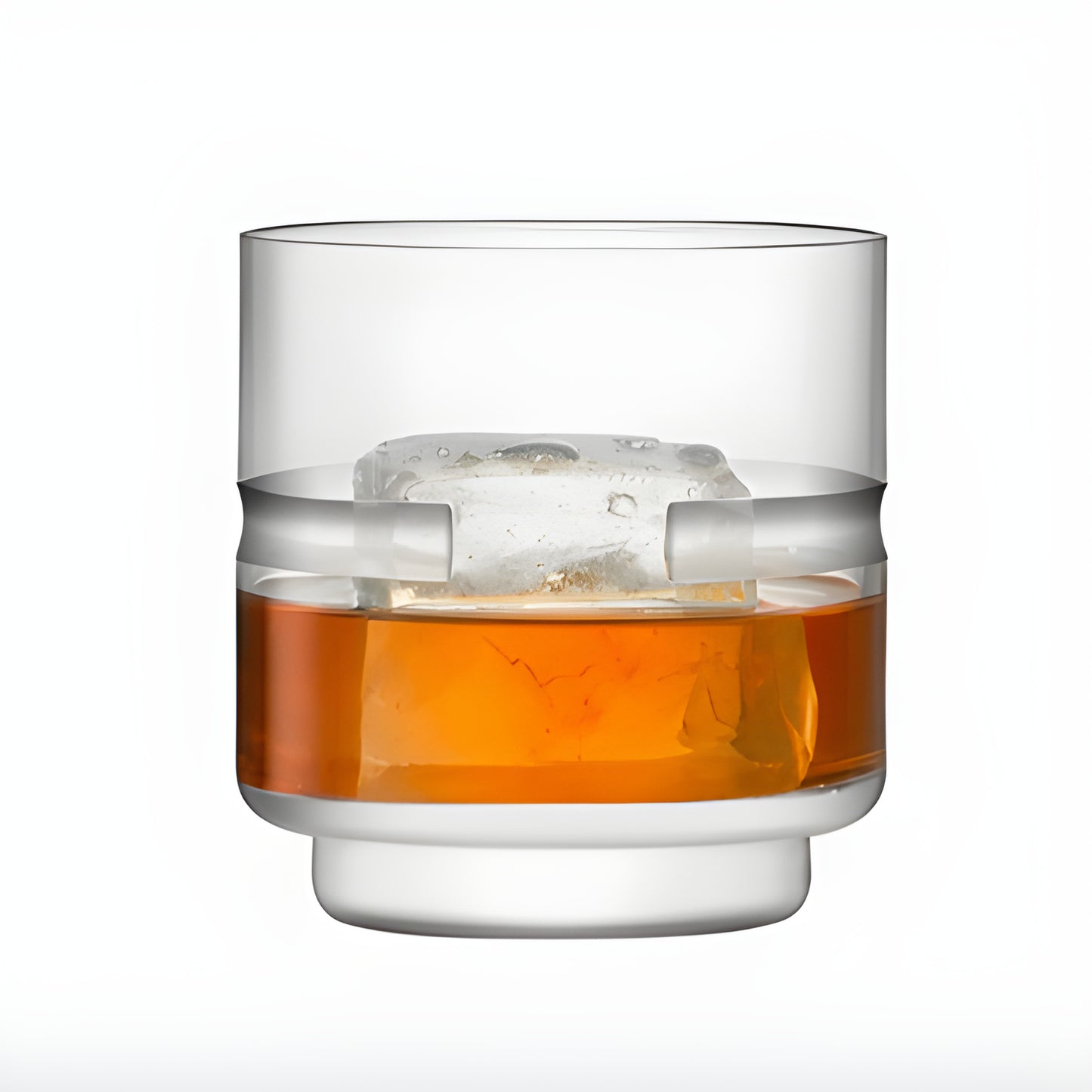 Modern whiskey glass with ice cube on white background.