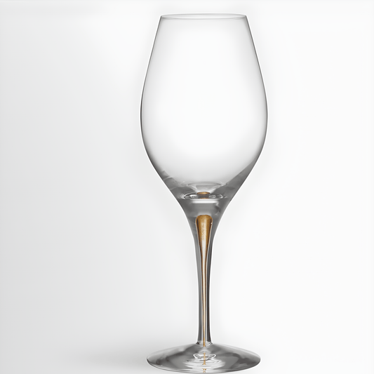 Modern wine glass with gold detailing and elegant, stylish design.