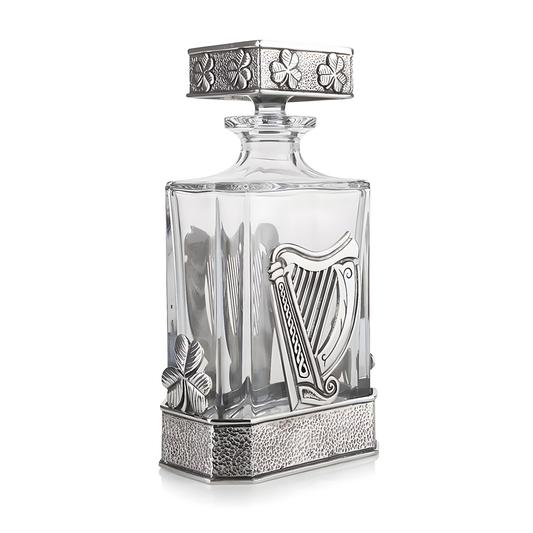 Irish harp and clover design on whiskey decanter glass bottle.