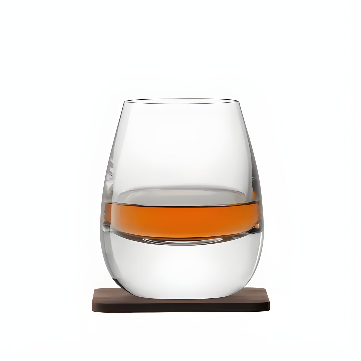 Islay whisky glass on wooden coaster with amber liquor.