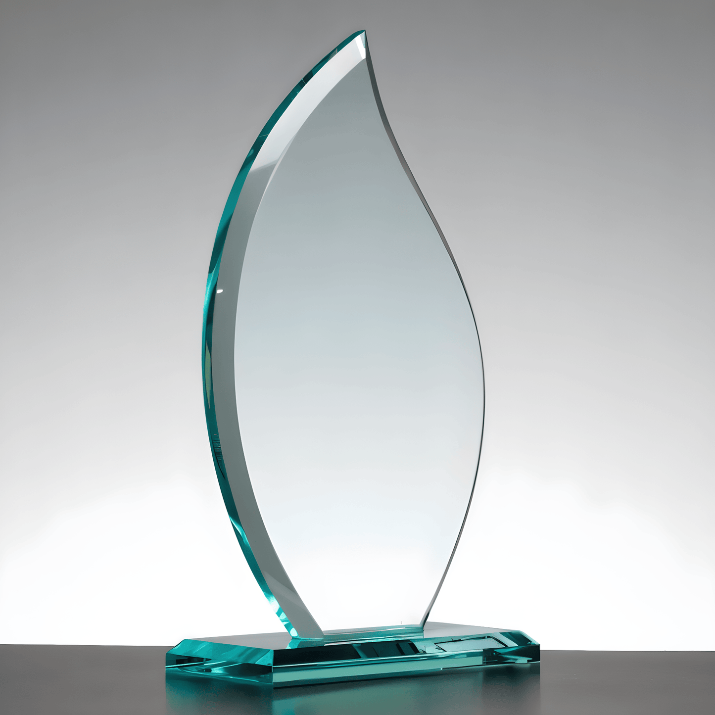 Jade flame glass award with clear design on black surface