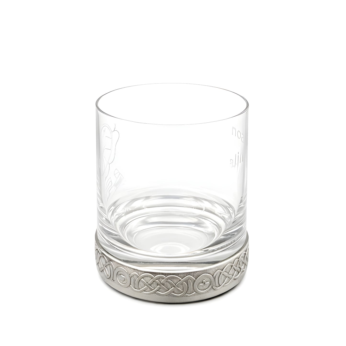 Clear whisky glass with a decorative pewter base featuring a Celtic pattern.