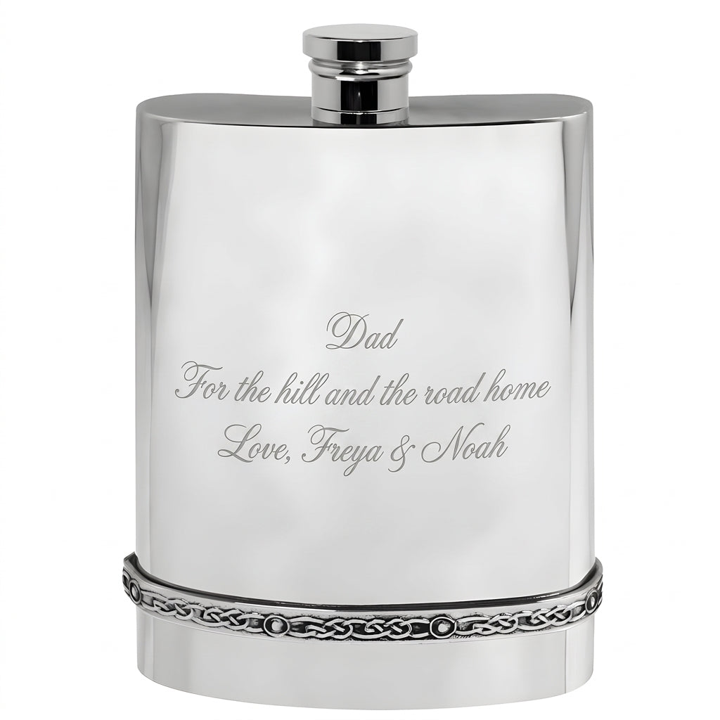 Example engraving (gift for dad): "Dad / For the hill and the road home / Love, Freya & Noah" on the Pewter Celtic Hip Flask
