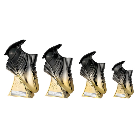 Set of black and gold metallic football boot trophies on display.