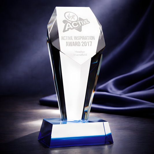 Optical crystal glass award for Active Inspiration 2017 on a dark background.