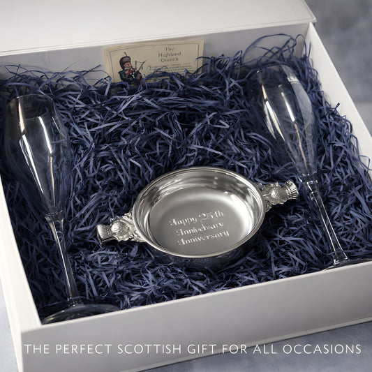 25th anniversary Scottish gift set with quaich and prosecco glasses in a gift box.