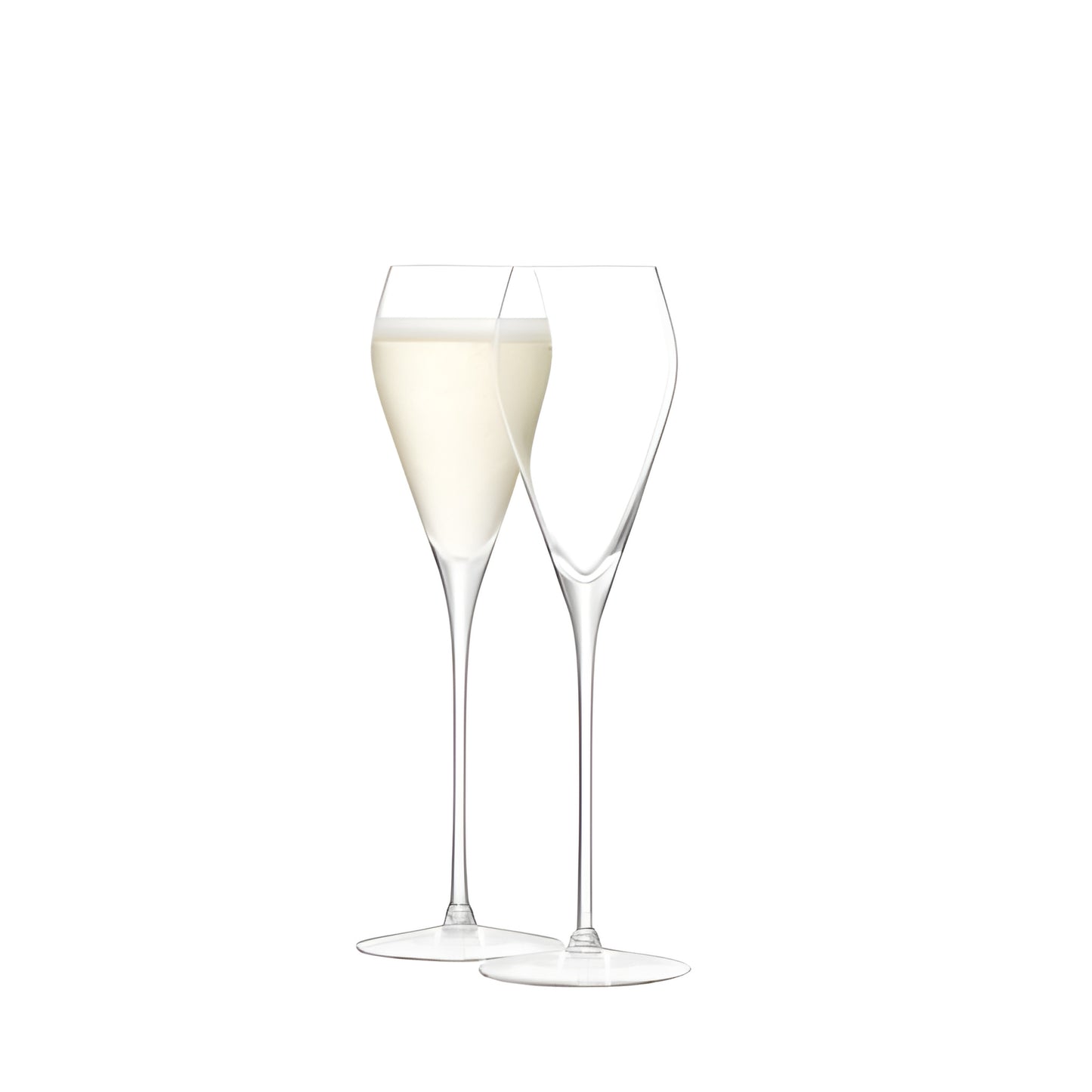 Two elegant prosecco flutes, one filled, showcasing a quaich gift set.