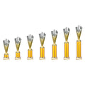 Set of seven silver and gold multisport trophy cups on white background.