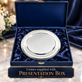 Silver plated Olde English salver in blue velvet presentation box on marble table.