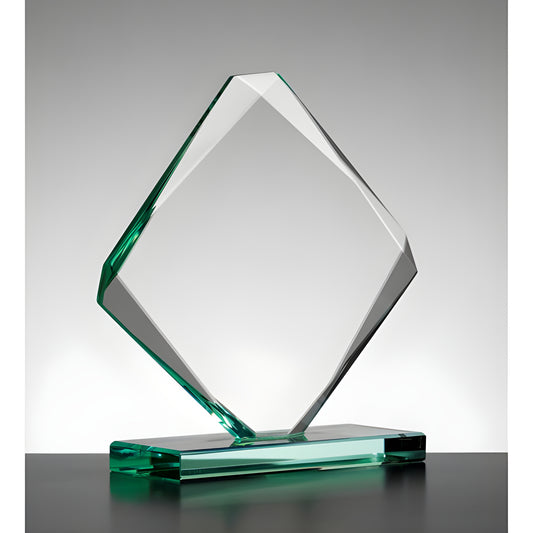 Clear emerald diamond-shaped glass award on a stand.