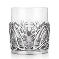 Silver stag antler whisky glass with intricate design.