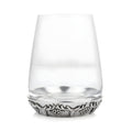 Clear glass tumbler with decorative antler design base.