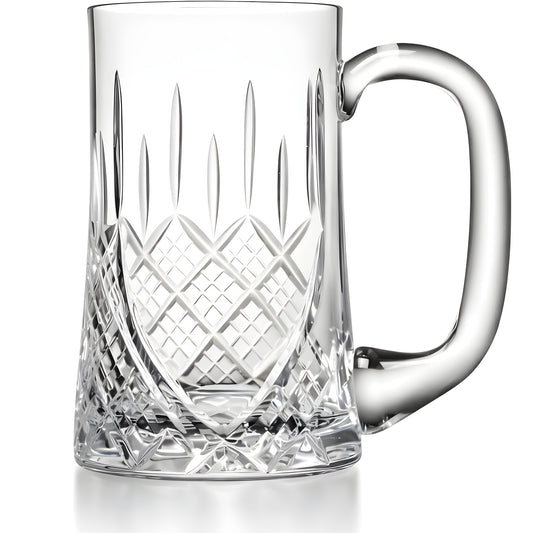Close-up of a crystal beer mug with intricate etched patterns.