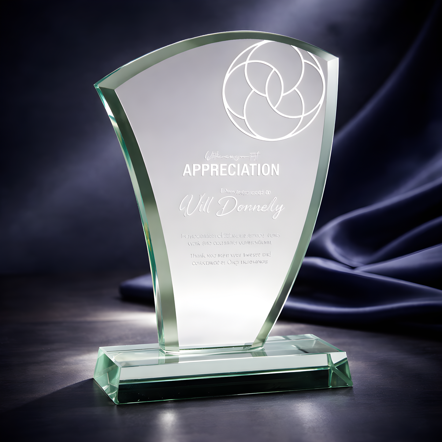 The Wave jade glass award trophy with etched appreciation text.