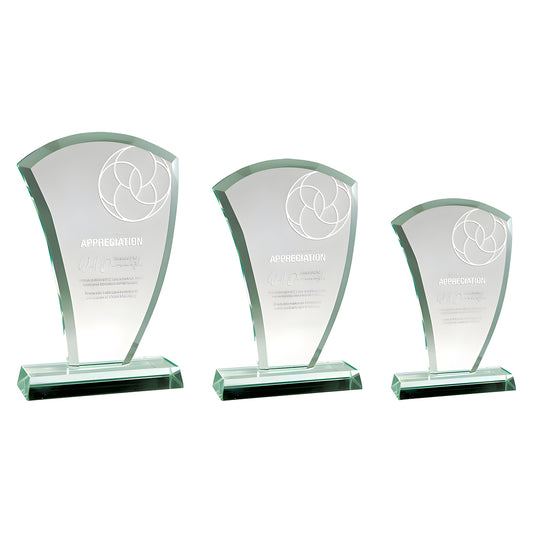 Three jade glass appreciation awards with engraved design on white background.