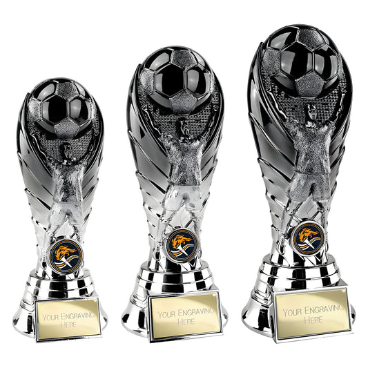 Three metallic soccer trophies with engraving plates and a football design.